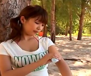Juicy brunette teen Mai Nishida wants you to check her tits out