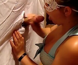 Sexy Teen Sucks Cock From Glory Hole While Boyfriends in the Other Room